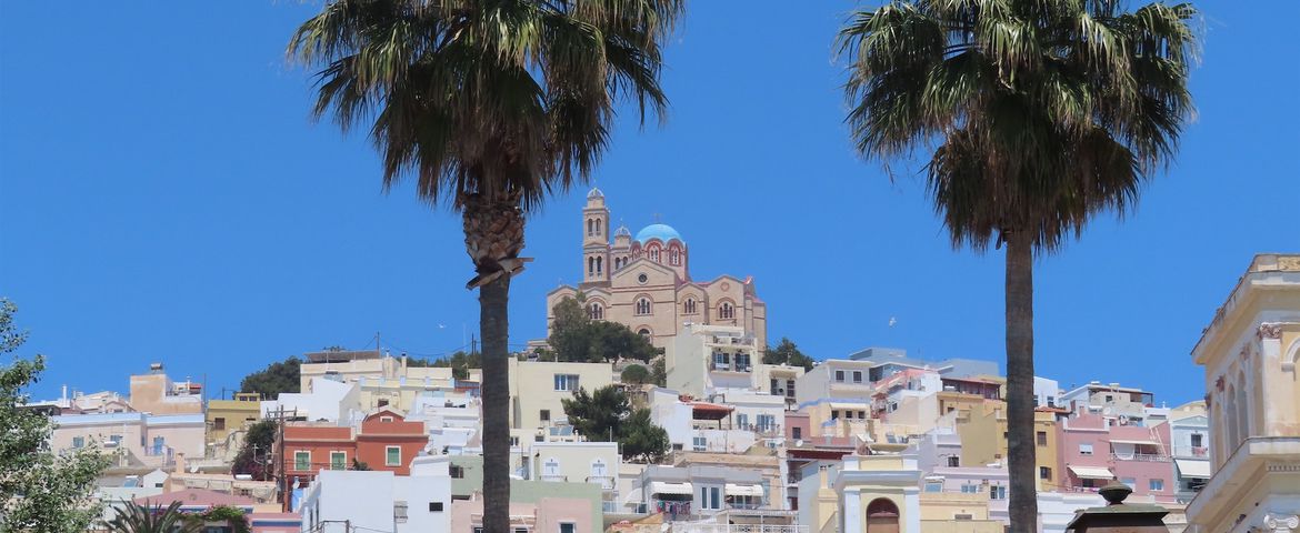 “<a href="https://www.flickr.com/photos/131701596@N07/52109891228" title="The orthodox church above Ermoupoli">The orthodox church above Ermoupoli</a>” by <a href="https://www.flickr.com/photos/131701596@N07/">Nicksy58</a>, <a href="https://creativecommons.org/licenses/by/2.0/deed.en" rel="license noopener noreferrer">CC BY 2.0</a>